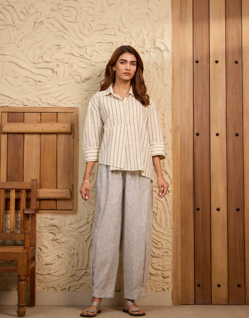 White Stripe Asymmetrical Shirt And Blue Pinstripe Pleated Hem Pants